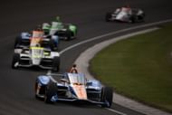 Kyle Larson leads a bunch of cars at the 108th tunning of the Indianapolis 500 - Source: Getty